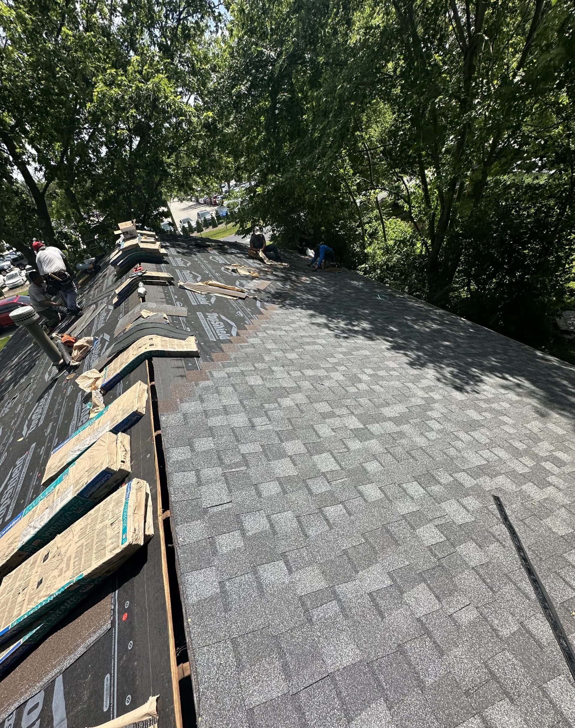 New shingles going on during a Pantheon roof job